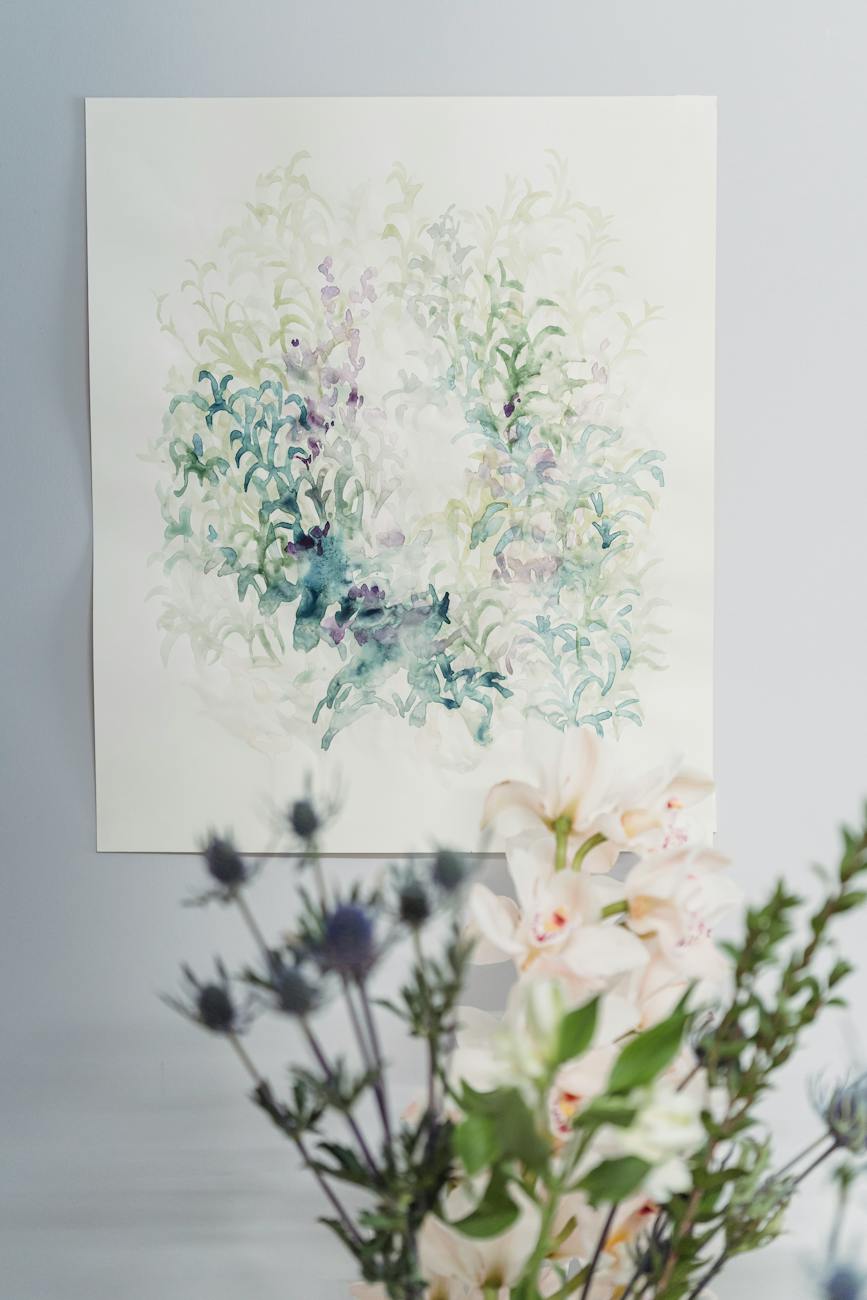 Watercolour painting of flowers in focus